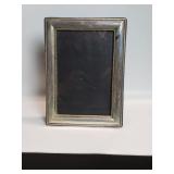 Sterling silver picture frame with glass face