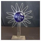 Vintage metal and blue glass celestial sun