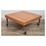 Modern coffee table on casters