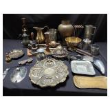 Group of brass, pewter, and iron trivet, vase,