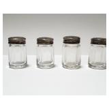 Group of sterling lidded salt and pepper shakers