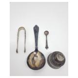 Group of sterling silver spoon, tongs, candle