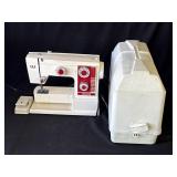 Vintage White sewing machine with carry case