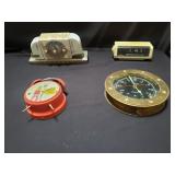 Group of vintage clocks and stove clock