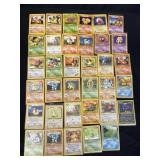 Group of vintage 1995 Pokï¿½mon trading cards