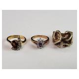 Three gold-plated rings with citrine, amethyst,