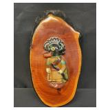 Vintage Native American Kachina figure on wood