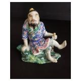Signed Chinese porcelain figurine