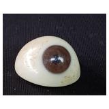 Antique plastic ocular prosthetic