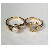 14k gold rings, one with a pearl, the other one