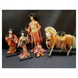 Group of vintage Asian dolls