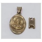 14k gold pendant and a watch link