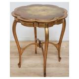 Vintage gilt side table with hand painted cherub
