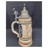 Vintage German beer stein with pewter lid