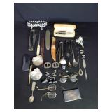 Group of miscellaneous silver plate tongs, s