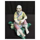 Signed Chinese porcelain figurine