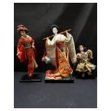 Group of Asian dolls