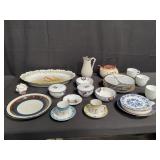 Group of porcelain serving tray, plates, tea cup