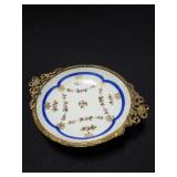 Sï¿½vres porcelain saucer with bronze mount