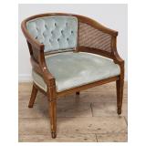Mid-century walnut caned barrel-back arm chair