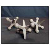 Three decorative cast iron jacks