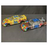 Pair of Earnie Ervin M & Mï¿½s racing die-cast cars