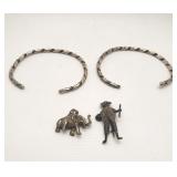 Group of silver bracelets, pendant and brooch