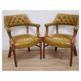 Pair of Chesterfield-style faux leather arm chairs