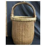 Vintage woven asian rice wicker basket with corks