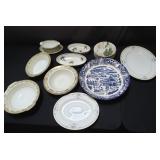 Group of porcelain dinner plates, bowls,