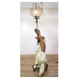 Vintage figural composite and metal torchiere