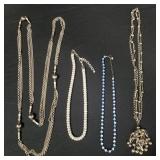 Riker display case of costume jewelry,