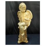 Plaster angel statue