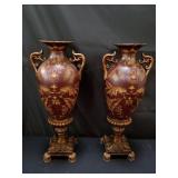 Pair of metal and composite vases
