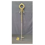 Antique brass and iron fire poker wall decoration