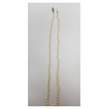Pearl necklace with platinum and diamond clasp