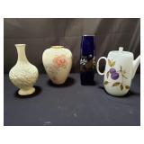 Group of ceramic and porcelain vases and teapots
