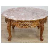 Contemporary carved wood coffee table with
