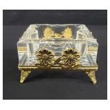 Hollywood Regency-style crystal and brass ashtray