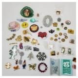 Group of costume jewelry, pins, buttons, brooches