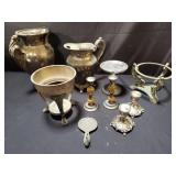 Group of silver plate pitchers, candle sticks,