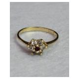 14k gold ring with red and clear stones