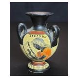 Greek hand painted ceramic vase depicting god