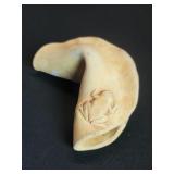 Clay sculpture with a frog motif