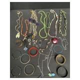 Group of costume jewelry: bracelets, necklaces etc