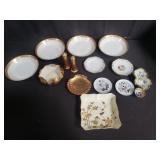 Group of porcelain saucers, bowl, salt and p