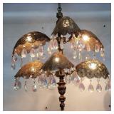Vintage metal chandelier with crystal prisms