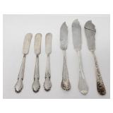 Group of sterling silver butter knives