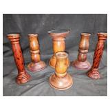Group of wood and metal candlesticks