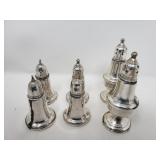 Group of sterling silver salt and pepper shakers